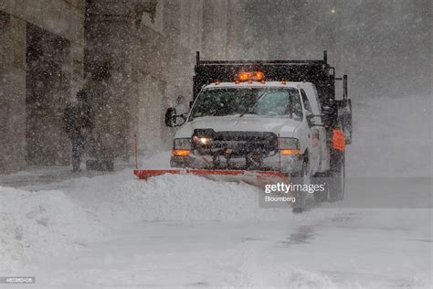 A Snow Plow Works To Clear Beacon Street As Winter Storm Juno News