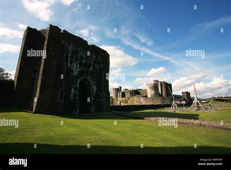 The Grounds Of Caerphilly Castle With Ancient Medieval Ruins And Wooden