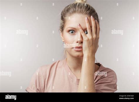 Excited Young Caucasian Woman Looks With Shocked Surprised Or Stunned