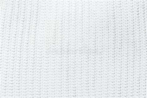 Knit Texture Background Of White Wool Knitted Fabric Stock Photo