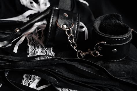 Premium Photo Leather Handcuffs And Whip For Bdsm Sex