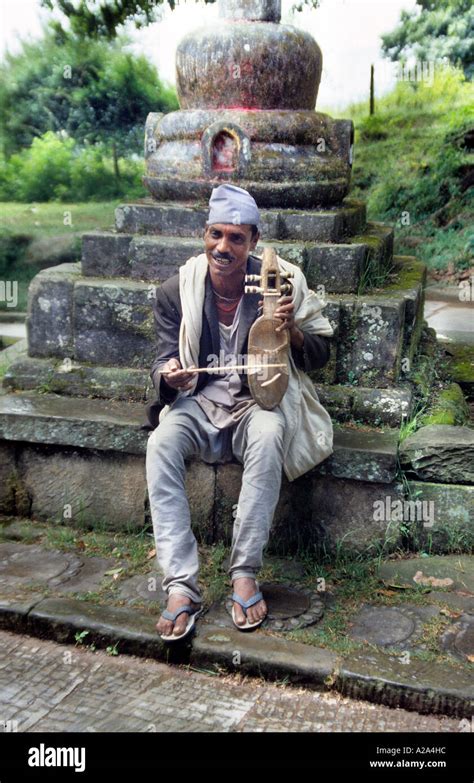 pashupatinath musician playing string instrument with bow kathmandu nepal stone carving monument