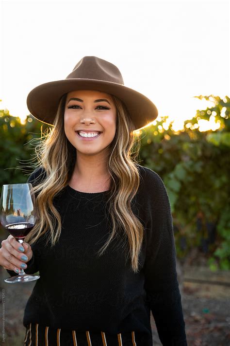 Hip Happy Woman With Wine By Stocksy Contributor Jayme Burrows Stocksy