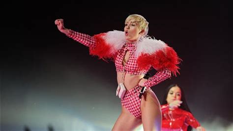 Miley Cyrus Spits At Crowd In Mexico Concert Whips Fake Butt With The