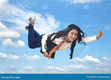 Businesswoman Flying With Umbrella Over Graph Isolated Stock Image