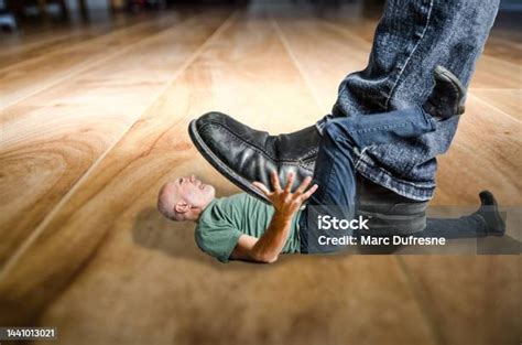 Man Crushed Under Giant Foot Stock Photo Download Image Now Crushed