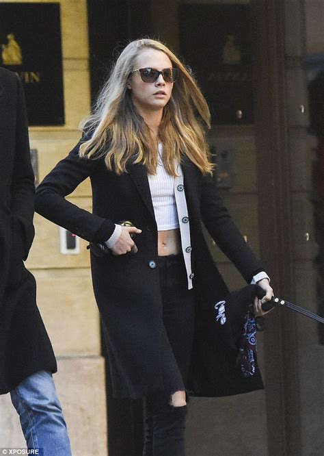 Cara Delevingne Flashes Her Incredibly Taut Tummy In Paris With Sister