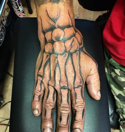 Creepy Cool Skeleton Hand Tattoos