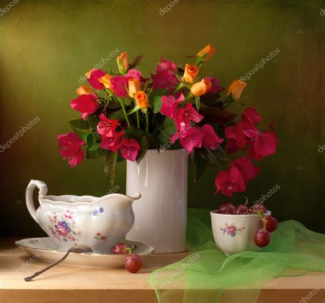 Beautiful Still Life With Flowers And Grapes — Stock Photo © Maglara