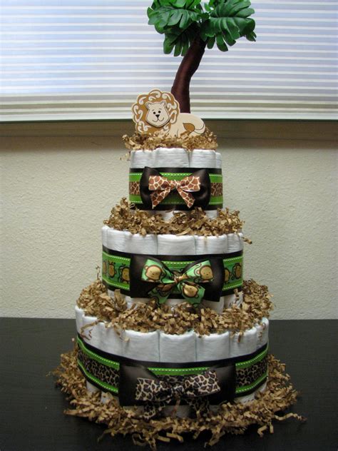 Here's an adorable and cheap source of decoration, which you can easily put together at home by yourself! Pin by Tara Ogdin on My Crafts/DIY Projects | Safari baby shower cake, Safari diaper cakes ...