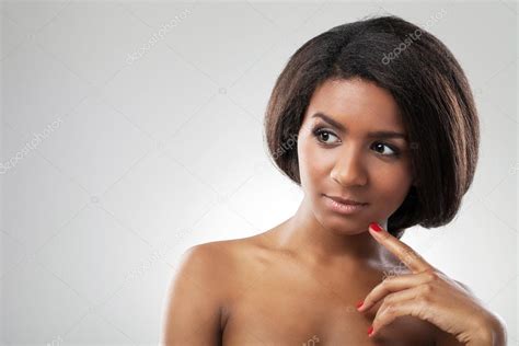 Beautiful Woman With Her Shoulders Naked Is Touching Her Shoulder Stock Photo