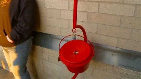 Anonymous Donor Drops Gold Coins In Red Kettle