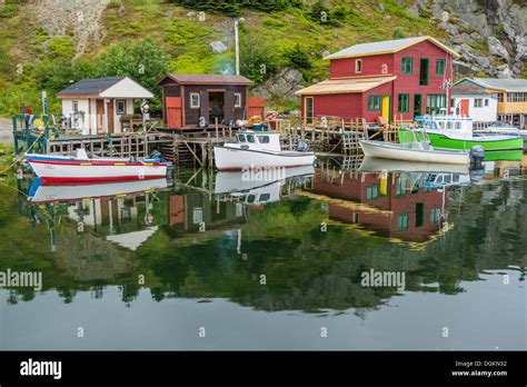 Small Boats Docked At The Small Harbor Of Quidi Vidi In Front Of