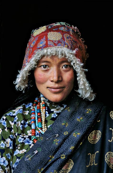 Tibetan Woman At Stupa Tibet 10067nf Steve Mccurry Afghan Girl