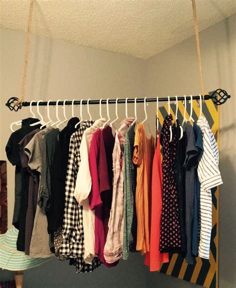I love dealing with ceiling solutions. When you need a little extra hanging space! Easy DIY ...