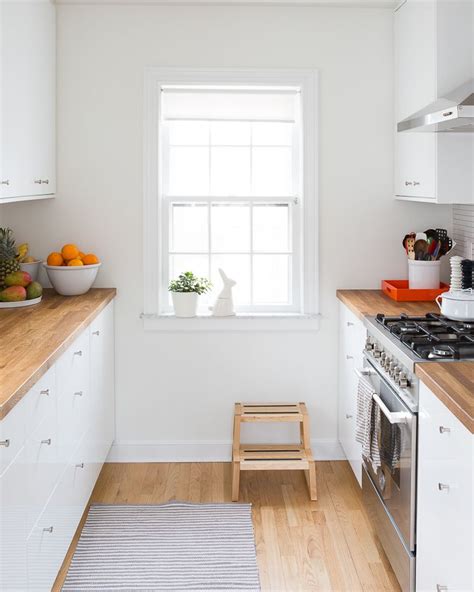 White galley kitchens small kitchen ideas download house beautiful. Small white kitchen with butcher block countertops. 14319 ...