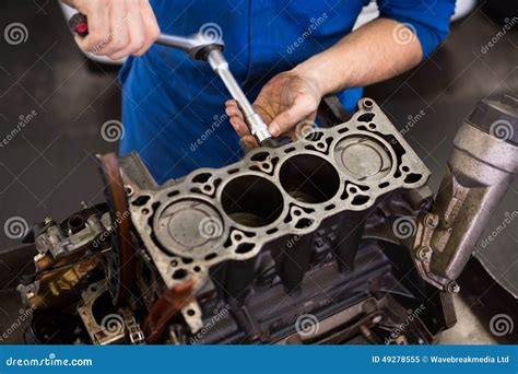 Mechanic Working On An Engine Stock Image Image Of Holding Caucasian