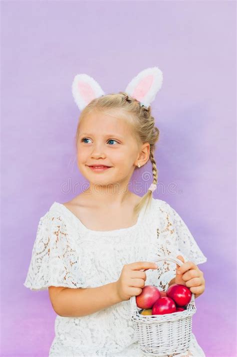 Easter Portrait Of Pretty Little Girl With Colorful Eggs Stock Image