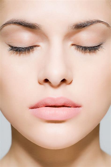 A Womans Face With Closed Eyes License Image Image Professionals
