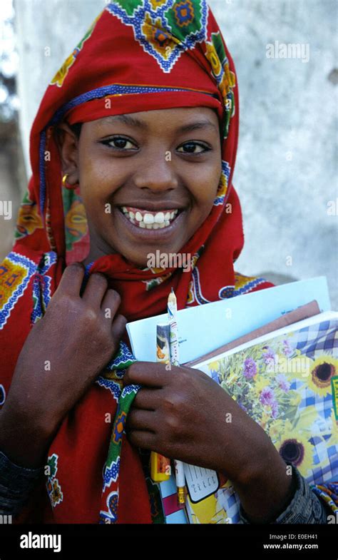 Smiling Somali Student Holding School Books Hi Res Stock Photography