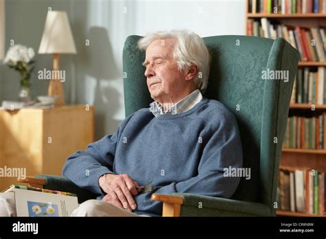 Senior Man Sleeping In Armchair Stock Photo 48750237 Alamy