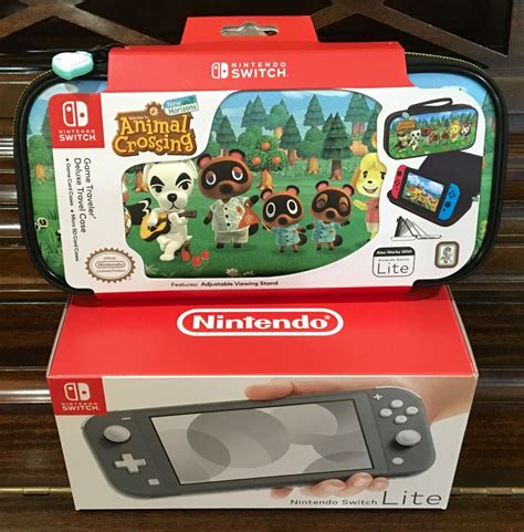 The quaint towns we roam in. Nintendo Switch Lite Grey Console with Animal Crossing ...