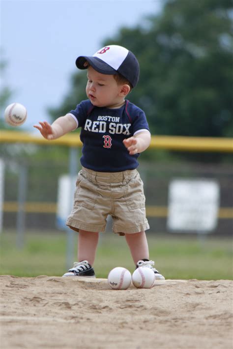Cute Little Boy Playing Baseball