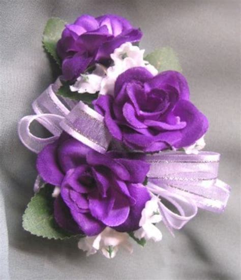 new purple sweetheart rose wrist corsage with 3 roses