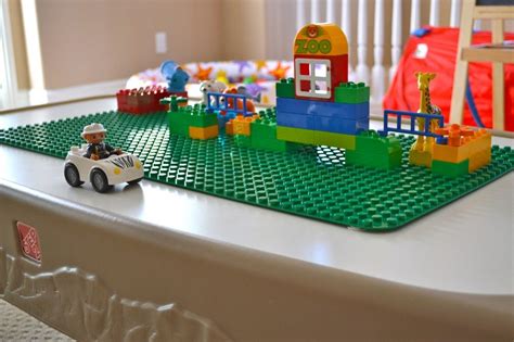 A Playroom Full Of Fun Playroom Lego Activity Table Kids Room