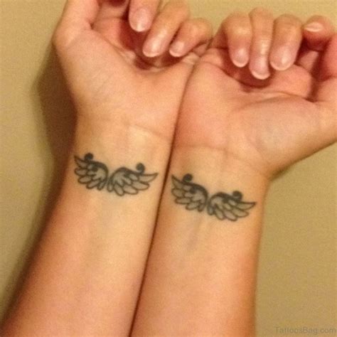 Heart and angel wings tattoo. 57 Superb Loving Memory Tattoos On Wrist