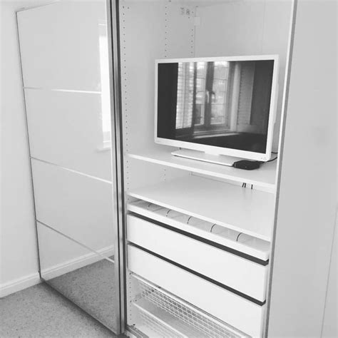 Once there we browsed the store while looking for a closet when we came across it we checked the height, width and depth the first color was yellow which didn't. IKEA Pax sliding door wardrobe with a TV shelf located on ...