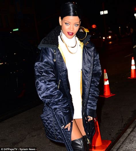 Rihanna Adds A Sexy Twist To Her Outfit By Pairing Her White Minidress With Thigh High Leather