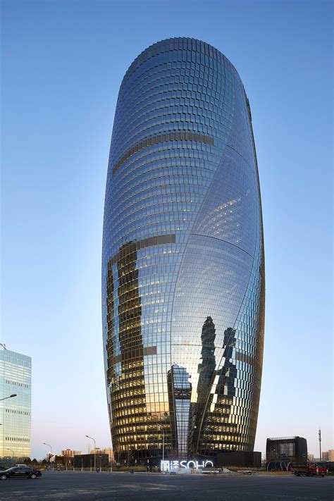 zaha hadid architects completes leeza soho tower with world s tallest atrium