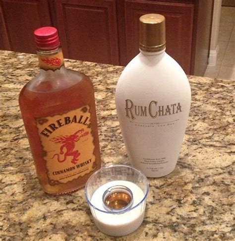 White chocolate peppermint latte with rum (elf approved). Rumchata and Fireball Shot Had these by accident, They ...