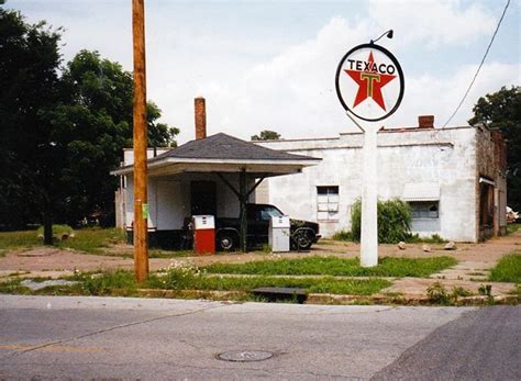 Often, it is cheaper to drive an older car with lower mpg than take on a car payment. The Texaco gas station in Paducah, Ky before it became a ...
