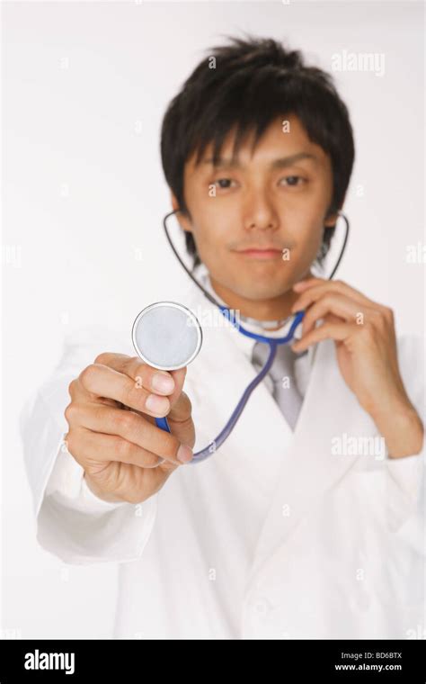 Doctor Doing Checkup With Stethoscope Stock Photo Alamy