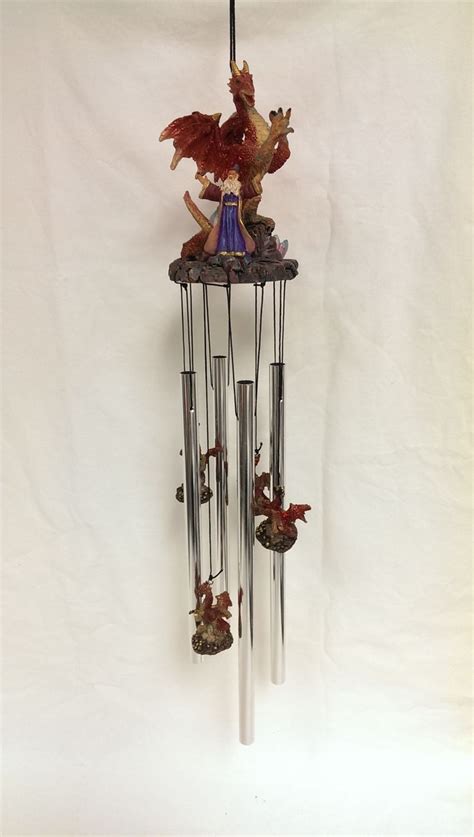 Gracie oaks bless our home windmill wall decor reviews. 41974 Dragon And Wizard Wind Chime | Wind chimes, Chimes, Decor