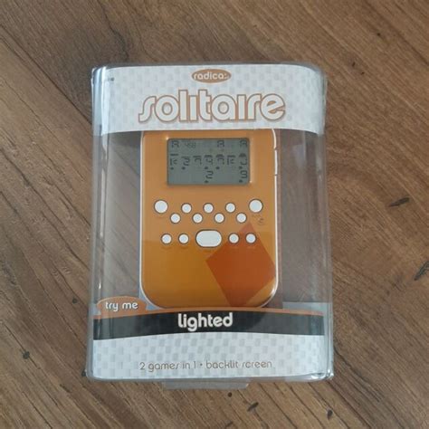 Mattel 2 Games Radica Lighted Solitaire Handheld Electronic Game For