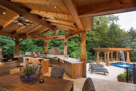 This modern home shows an indoor space that opens up to an outdoor world complete with swimming. House Wow!: Pool With Waterfall; Heated Outdoor Kitchen ...