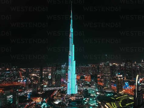 Aerial View Of Illuminated Burj Khalifa Tower At Night In Dubai United