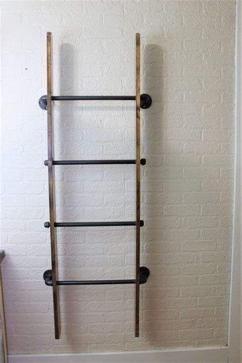 Shop from weighted blankets & quilted blankets to ultrasoft, sherpa blankets & electric curtains throws & blankets electric blankets cushions plants, pots & vases wall art, mirrors & clocks floor. Industrial Metal and Wood Wall Ladder Blanket Ladder (With ...