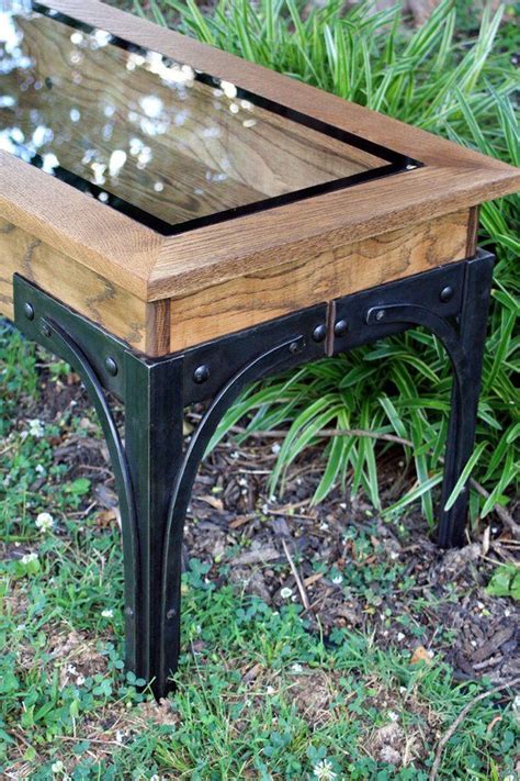 Get it as soon as tue, jul 27. Industrial Style Display Coffee Table. Tempered Glass ...