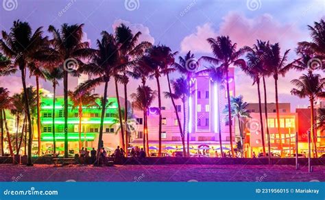Miami Beach Ocean Drive Hotels And Restaurants At Sunset City Skyline With Palm Trees At Night