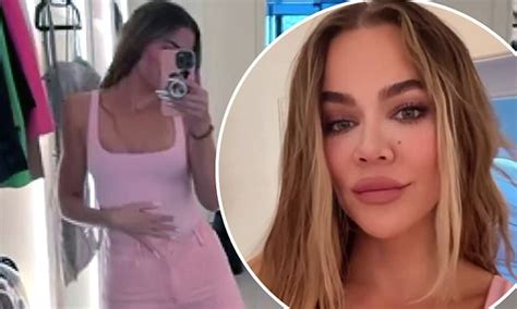 Khloe Kardashian Shows Off Ample Cleavage In A Plunging Pink Bodysuit