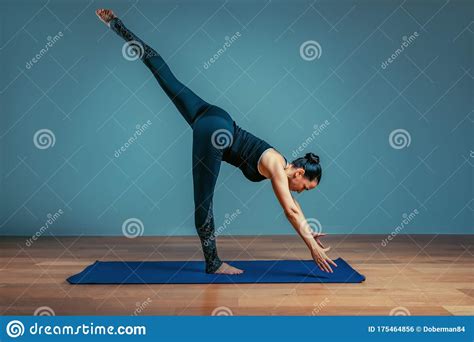 Bakasana (crane) posture is also known as the crow posture in yoga. Young Asian Woman In The Bakasana Crane Yoga Pose ...
