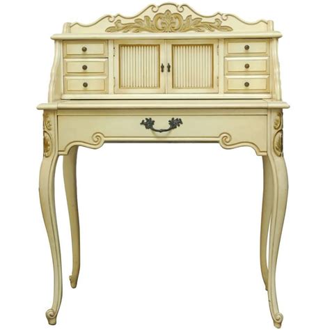 4 sided legs have been titled in different directions that are showing a splendid image in the whole writing desk creation. French Provincial Style Ladies Writing Desk at 1stdibs