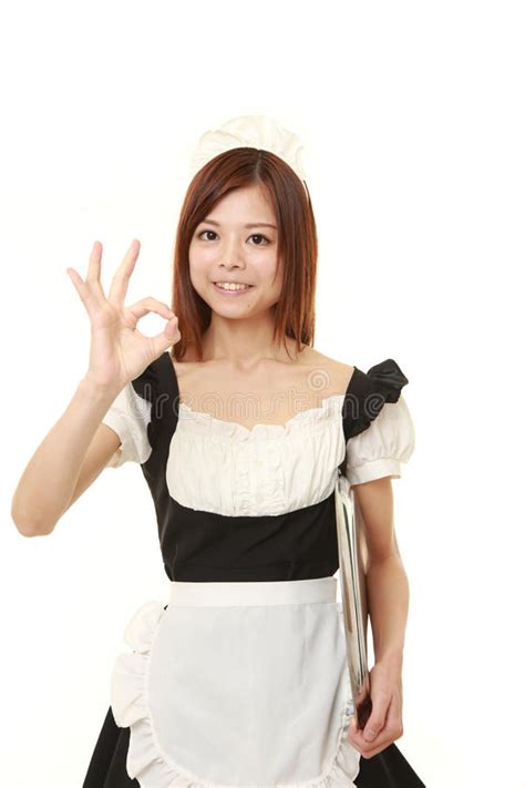 Young Japanese Woman Wearing French Maid Costume Showing