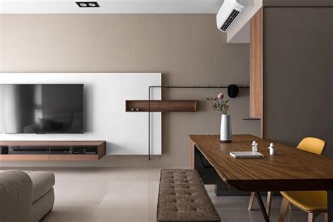 The design and colour of the woodgrain cabinets lends an interesting touch in the living room and looks astoundingly charming against the natural light. Japanese living in Taiwan by HOZO interior design 02 (With ...