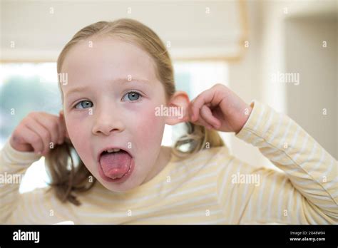 Young Girl Making Funny Faces Stock Photo Alamy