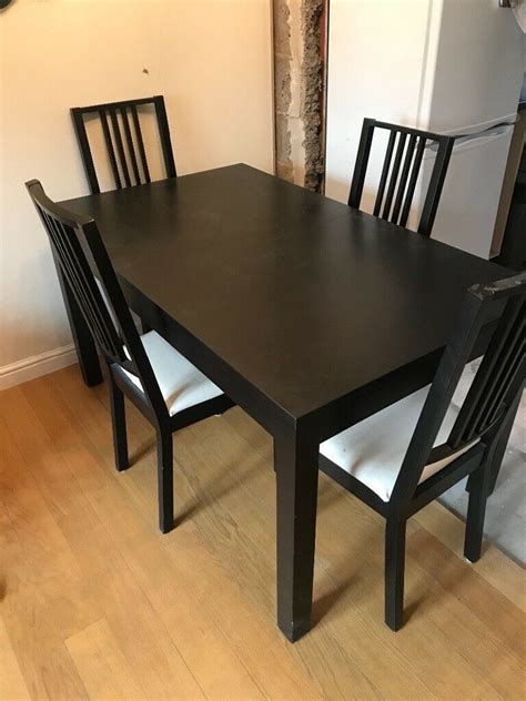 Every table is unique, with varying grain pattern and natural color shifts that are part of the charm of wood. Ikea Lerhamn Black Dining Table And 4 Chairs | in ...